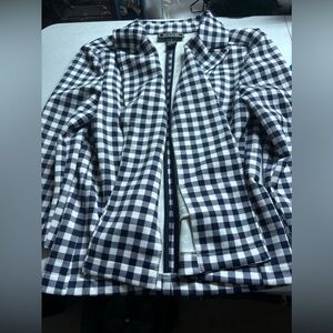 A plaid black and white blazer